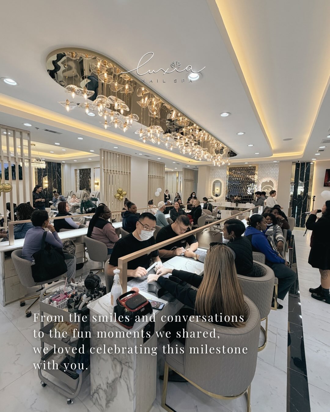 Luxia Nail Spa bustling celebration event with guests enjoying nail services