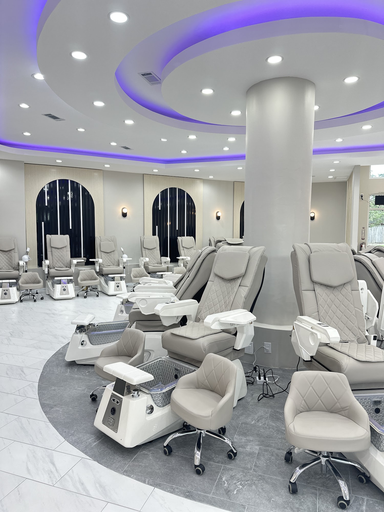 Premium pedicure spa chairs with ambient lighting