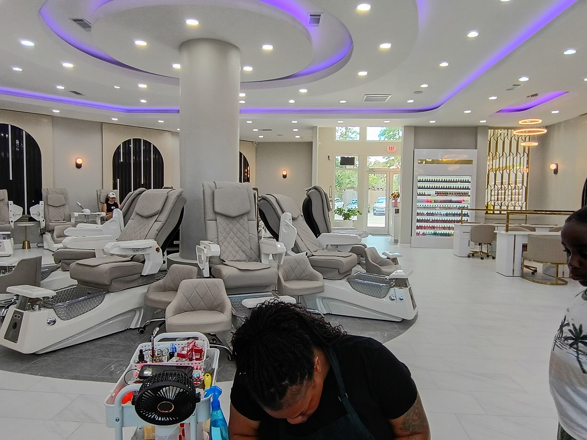 Modern ring chandeliers illuminating the spa interior